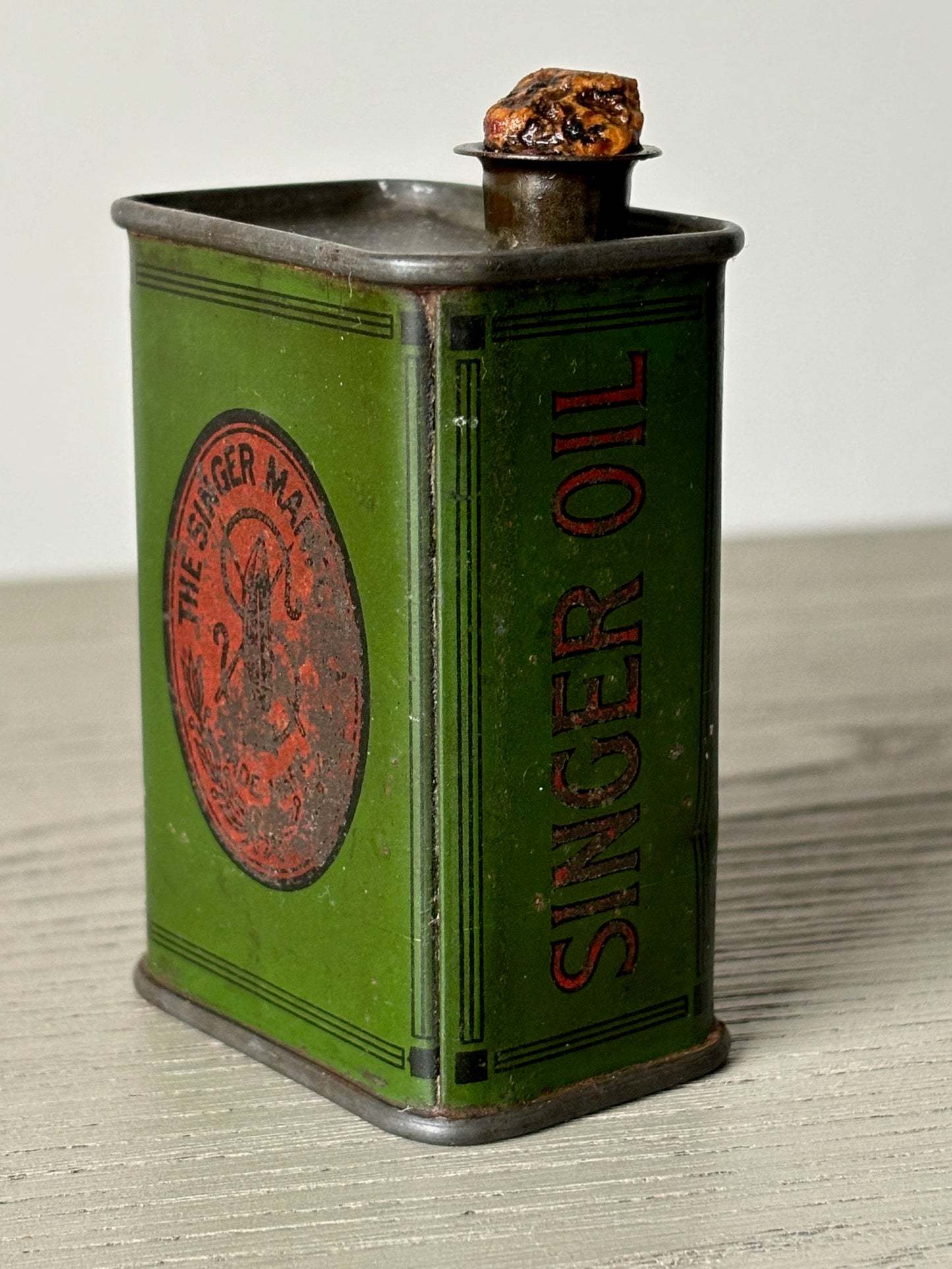 SINGER OIL can